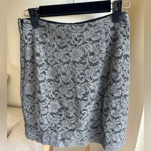 Barney’s grey patterned skirt